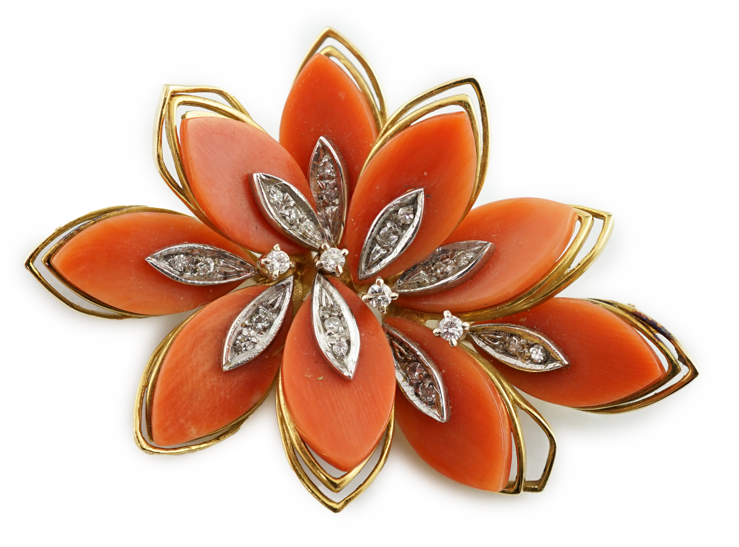 A modern Italian 18k gold, coral and diamond chip set leaf brooch